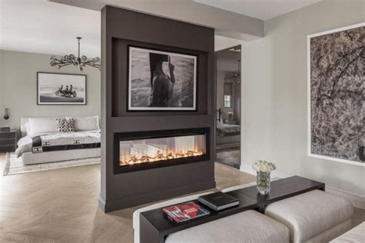 double sided fireplace between two rooms