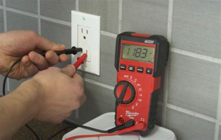test outlet with multimeter