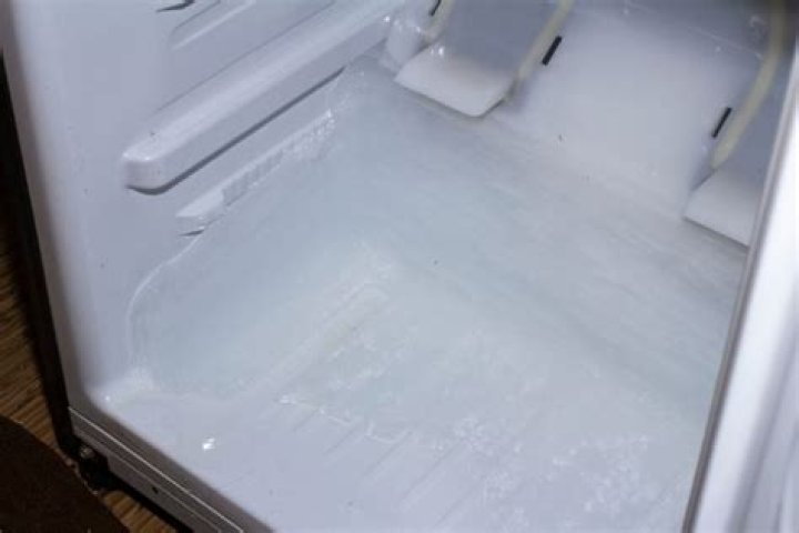 why is my fridge leaking water inside